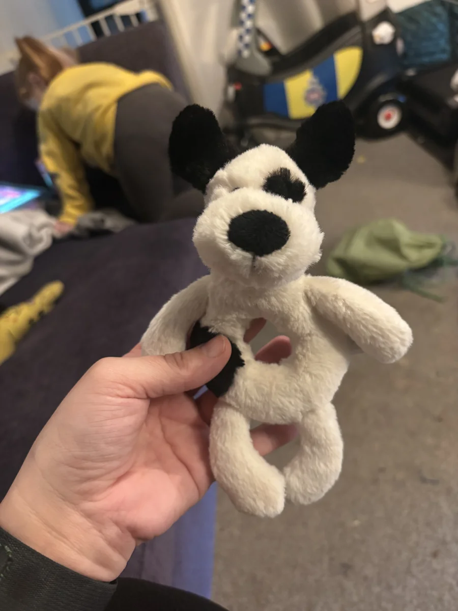 Front - Bashful Black & Cream Puppy Ring Rattle photo by Amber_1996