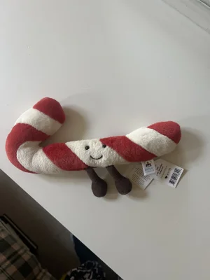 A photo of Amuseables Candy Cane - Large Jellycat taken by Sopria