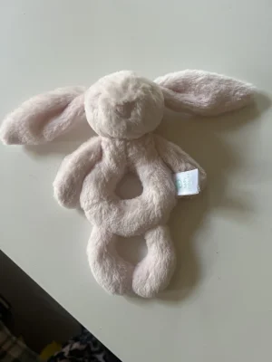 A photo of Bashful Bunny Ring Rattle - Beige Jellycat taken by Sopria