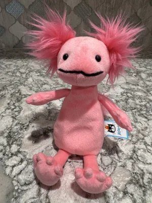 A photo of Alice Axolotl - Small Jellycat taken by SnowLeopard821