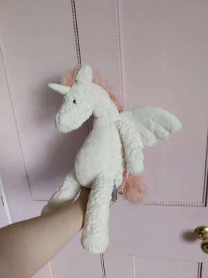 A photo of Lallagie Unicorn Jellycat taken by Griffin