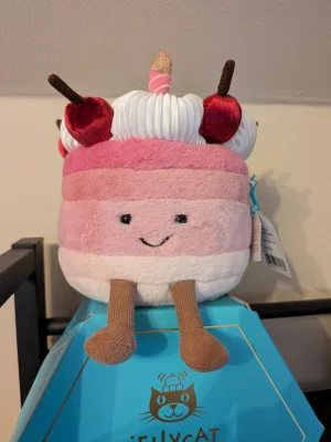 A photo of Cheryl Cherry Cake Jellycat taken by JJ_Sausage