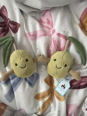 A photo of Amuseables Pair of Olives Jellycat taken by millie_mxx