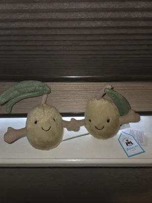 A photo of Amuseables Pair of Olives Jellycat taken by Makayla
