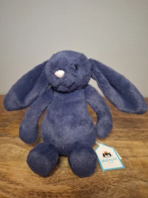 A photo of Bashful Navy Bunny - Small Jellycat taken by Sofie