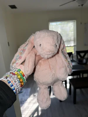 A photo of Blossom Blush Bunny - Medium Jellycat taken by alinsey