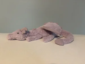 A photo of Lavender Dragon - Small Jellycat taken by owenthebean