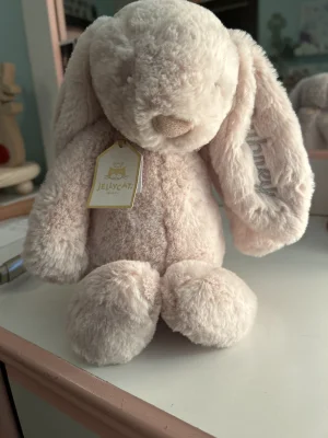 A photo of Bashful Luxe Bunny Willow with Personalised Cream Jumper Jellycat taken by Aubrey_herbert