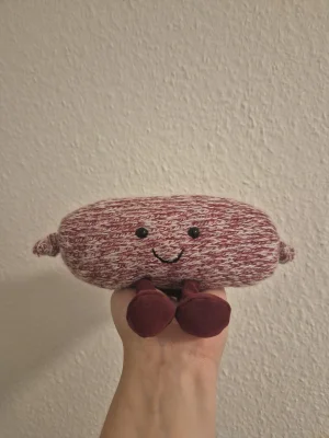 A photo of Amuseables Sausage Jellycat taken by Helena