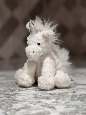 A photo of Fuddlewuddle Unicorn - Baby Jellycat taken by SnowLeopard821