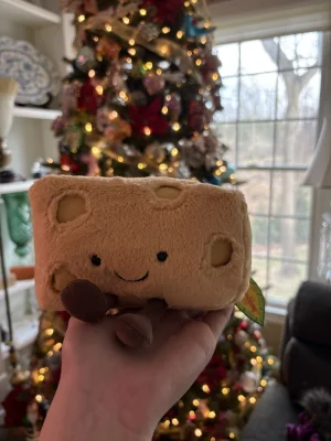 A photo of Amuseables Swiss Cheese Jellycat taken by amandamariejelly