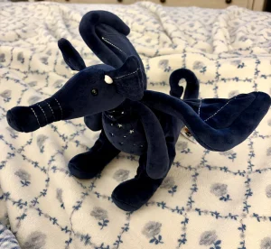 A photo of Moonlight Dragon Jellycat taken by Stephmarie207
