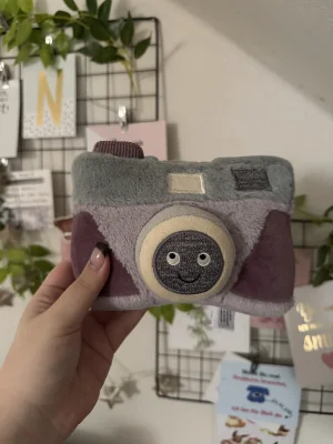 A photo of Wiggedy Camera Jellycat taken by nelesjellycorner