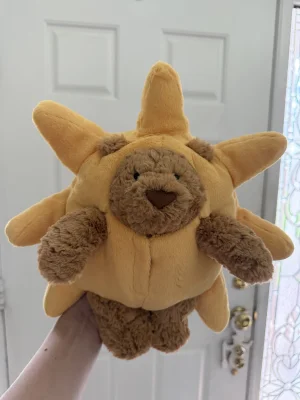 A photo of Bartholomew Bear Sun Outfit Jellycat taken by amandamariejelly