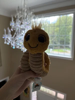 A photo of Wiggly Worm - Yellow Jellycat taken by amandamariejelly