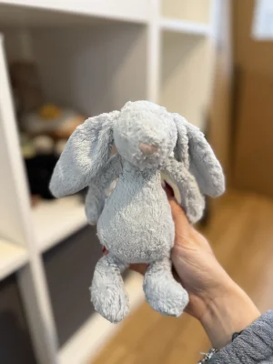 A photo of Bashful Blue Bunny Rattle Jellycat taken by lily_capon