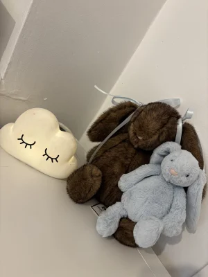 A photo of Bashful Blue Bunny Rattle Jellycat taken by Emily1997x