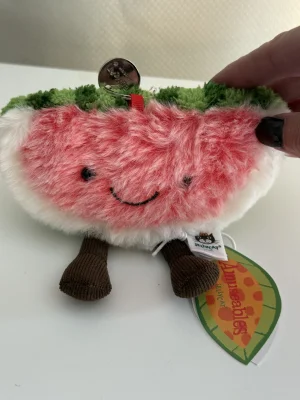 A photo of Amuseables Watermelon Bag Charm Jellycat taken by Bunnylove