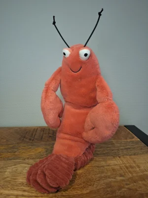 A photo of Larry Lobster - Medium Jellycat taken by Sofie