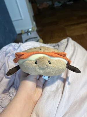 A photo of Amuseables Bagel Jellycat taken by butt0n_d0ll