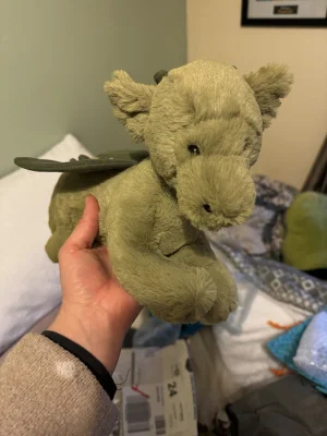 A photo of Monty Dragon - Medium Jellycat taken by Chelsea_Jellies