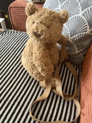 A photo of Bartholomew Bear Backpack Jellycat taken by Elly_jelly