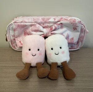 A photo of Amuseables Pair of Marshmallows Bag Charm Jellycat taken by LoveShackFancy_13