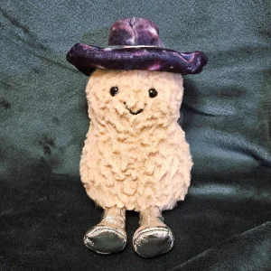 A photo of Amuseables Peanut Space Rodeo Outfit Jellycat taken by minnievan