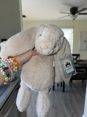 A photo of Bashful Oatmeal Bunny - Medium Jellycat taken by alinsey