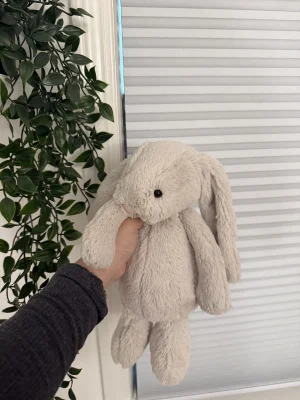 A photo of Bashful Oatmeal Bunny - Medium Jellycat taken by ch1n4ss