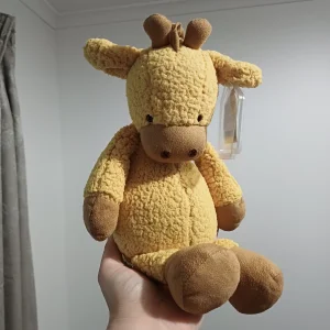 A photo of Whimsey Giraffe Jellycat taken by herbgardenplush
