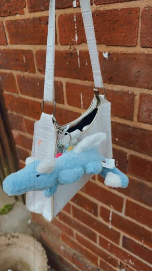 A photo of Sky Dragon Bag Charm Jellycat taken by beth_louiisee