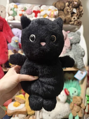 A photo of Kutie Pops Kitty - Medium Jellycat taken by amandamariejelly