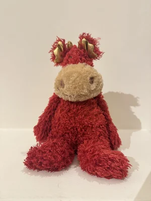 A photo of Bunglie Dragon (Red) - Medium Jellycat taken by kit21088