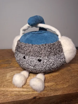 A photo of Amuseables Sports Cariss Curling Stone Jellycat taken by Sofie