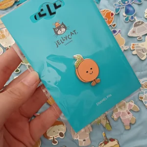 A photo of Amuseables Peach Pin Badge Jellycat taken by herbgardenplush