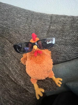 A photo of Cecile Chicken Jellycat taken by Ottipeanut