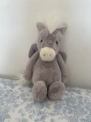 A photo of Bashful Pegasus Jellycat taken by JellyByRaee_11