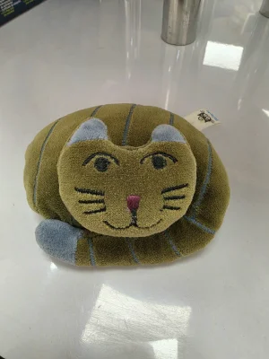 A photo of Cat Nap Green - Small Jellycat taken by snowfox