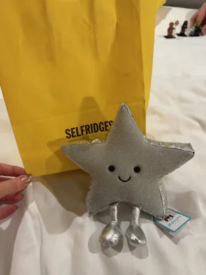 A photo of Amuseables Silver Star Jellycat taken by lozbozjellys