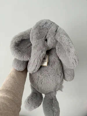 A photo of Bashful Luxe Elephant Thuddeus - Medium Jellycat taken by elysjellies