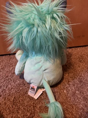 A photo of Cosmo Monster Jellycat taken by Cosmeom