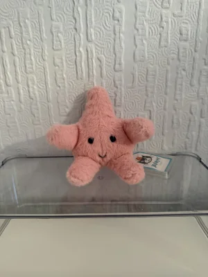 A photo of Fluffy Starfish Jellycat taken by Bethanyxox