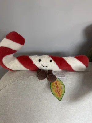 A photo of Amuseables Candy Cane - Little Jellycat taken by thehappy_huddle