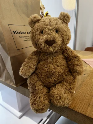 A photo of Bartholomew Bear - Medium Jellycat taken by Mila<3Jellycats!!