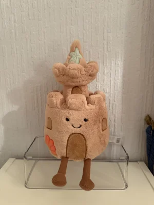 A photo of Amuseables Sandcastle Jellycat taken by Bethanyxox