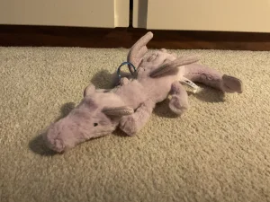 A photo of Lavender Dragon Bag Charm Jellycat taken by izzfizzv13