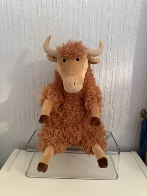 A photo of Herbie Highland Cow Jellycat taken by Bethanyxox