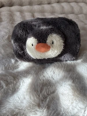 Peanut Penguin Pouch Jellycat photo